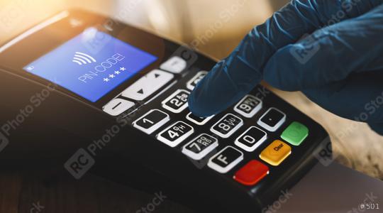 Woman hand with medical latex protective gloves enters PIN code on payment terminal in a cafe. Protection for Coronavirus or COVID-19.   : Stock Photo or Stock Video Download rcfotostock photos, images and assets rcfotostock | RC Photo Stock.: