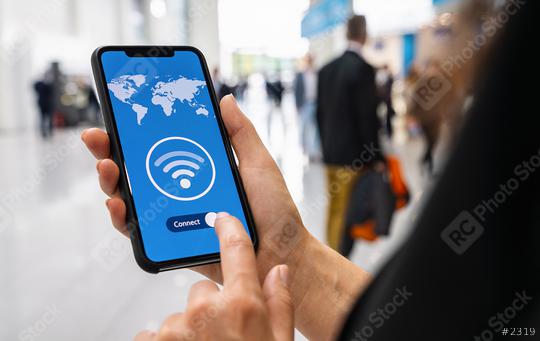 Woman hands holding phone with app vpn creation Internet protocols for protection private network on screen in a pedestrian zone.  : Stock Photo or Stock Video Download rcfotostock photos, images and assets rcfotostock | RC-Photo-Stock.: