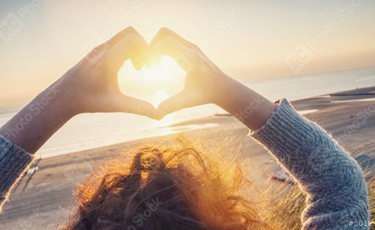 Woman hands in Heart symbol shaped with sunset light on the beac  : Stock Photo or Stock Video Download rcfotostock photos, images and assets rcfotostock | RC Photo Stock.: