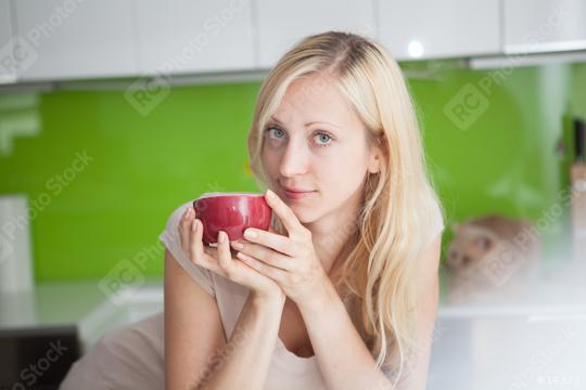 Woman has coffee break at home  : Stock Photo or Stock Video Download rcfotostock photos, images and assets rcfotostock | RC Photo Stock.:
