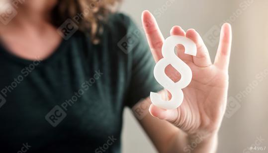 woman holding a paragraph sign for legal advice  : Stock Photo or Stock Video Download rcfotostock photos, images and assets rcfotostock | RC Photo Stock.: