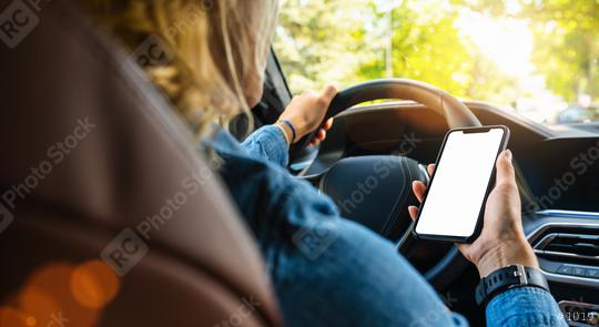 Woman holding black mobile phone in hands with blank desktop screen while car driving at summer in the city, Mockup image  : Stock Photo or Stock Video Download rcfotostock photos, images and assets rcfotostock | RC Photo Stock.: