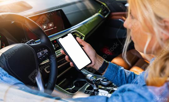 Woman holding black mobile phone in hands with blank desktop screen while car driving at summer in the city, Mockup image  : Stock Photo or Stock Video Download rcfotostock photos, images and assets rcfotostock | RC Photo Stock.: