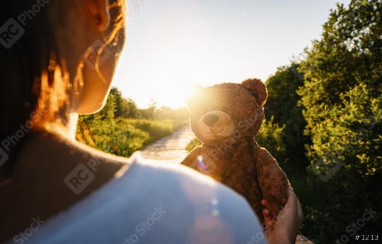 Woman holding teddy bear toy at sunset, copyspace for your individual text.  : Stock Photo or Stock Video Download rcfotostock photos, images and assets rcfotostock | RC Photo Stock.: