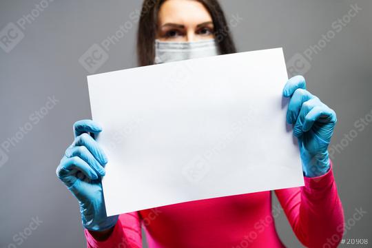 woman in medical mask and gloves showing empty blank paper in her hands. Focus on a piece of paper. prevent others from corona COVID-19 and SARS cov 2 infection, copy space for individual text  : Stock Photo or Stock Video Download rcfotostock photos, images and assets rcfotostock | RC Photo Stock.: