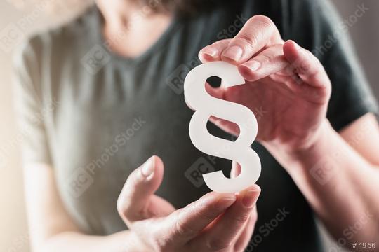 woman presents a paragraph sign  : Stock Photo or Stock Video Download rcfotostock photos, images and assets rcfotostock | RC Photo Stock.: