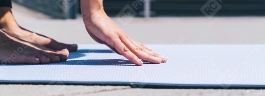 Woman starts stretching workout on a yoga mat outside, with focus on hands. copyspace for your individual text.  : Stock Photo or Stock Video Download rcfotostock photos, images and assets rcfotostock | RC Photo Stock.: