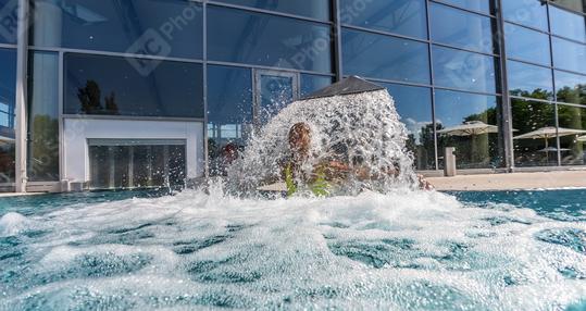 woman under a waterfall faucet in a spa swimming-pool  : Stock Photo or Stock Video Download rcfotostock photos, images and assets rcfotostock | RC Photo Stock.: