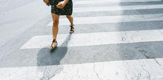 woman walking on a zebra crossing  : Stock Photo or Stock Video Download rcfotostock photos, images and assets rcfotostock | RC Photo Stock.:
