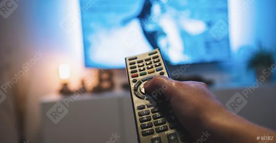 woman Watching tv and using remote control, pov shot  : Stock Photo or Stock Video Download rcfotostock photos, images and assets rcfotostock | RC Photo Stock.: