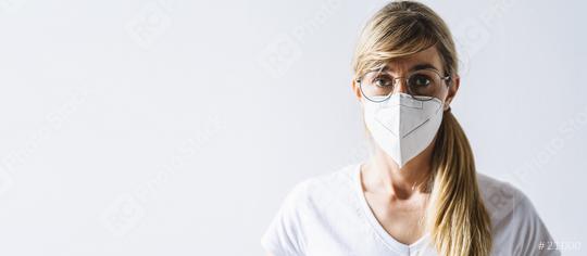 Woman wearing N95 FFP2 an anti virus protection mask to prevent others from corona COVID-19 and SARS cov 2 infection, with copy space for individual text  : Stock Photo or Stock Video Download rcfotostock photos, images and assets rcfotostock | RC Photo Stock.: