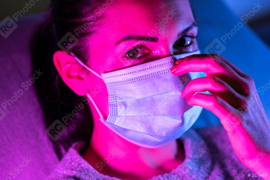 woman wearing virus face mask protection in colourful bright neon uv lights posing at a club or disco  : Stock Photo or Stock Video Download rcfotostock photos, images and assets rcfotostock | RC Photo Stock.: