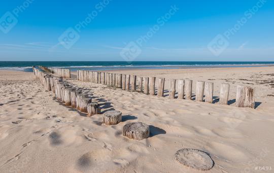 Wooden breakwaters on beautiful sandy beach on sunny summer day  : Stock Photo or Stock Video Download rcfotostock photos, images and assets rcfotostock | RC Photo Stock.: