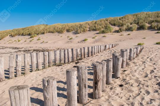 Wooden groynes on beautiful sandy beach dunes in Domburg, Zeeland, Holland  : Stock Photo or Stock Video Download rcfotostock photos, images and assets rcfotostock | RC Photo Stock.: