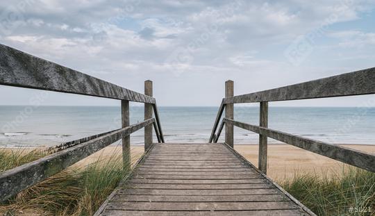 Wooden path at Baltic sea over sand dunes with ocean view with d  : Stock Photo or Stock Video Download rcfotostock photos, images and assets rcfotostock | RC Photo Stock.: