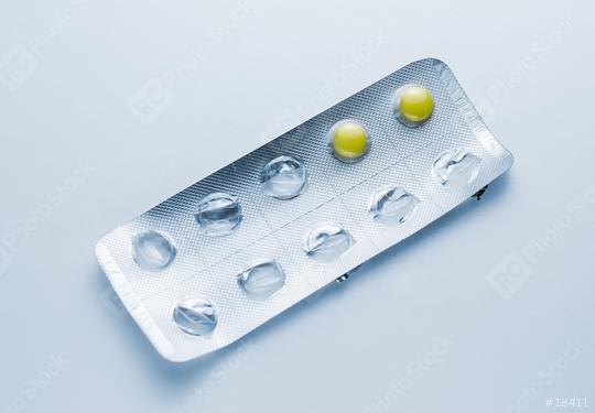 Yellow Tablets pills flu in a Blister packaging doctor antibiotic pharmacy medicine medical  : Stock Photo or Stock Video Download rcfotostock photos, images and assets rcfotostock | RC Photo Stock.: