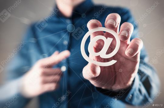 young business man holding email sign (at sign)  : Stock Photo or Stock Video Download rcfotostock photos, images and assets rcfotostock | RC Photo Stock.: