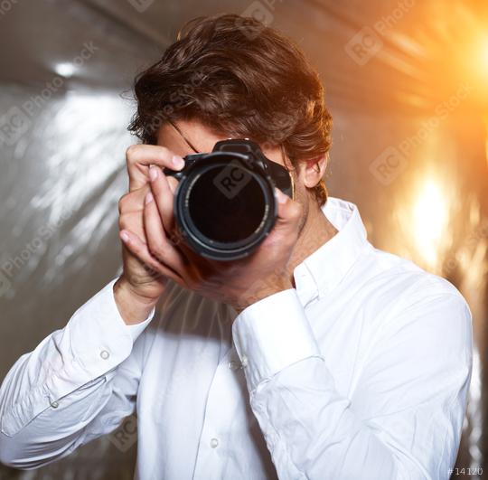 Young handsome photographer  : Stock Photo or Stock Video Download rcfotostock photos, images and assets rcfotostock | RC Photo Stock.: