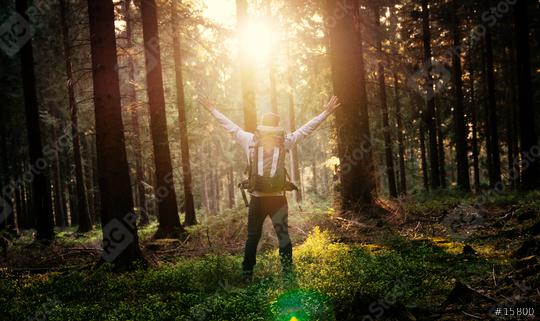 Young man in silent forrest with sunlight  : Stock Photo or Stock Video Download rcfotostock photos, images and assets rcfotostock | RC Photo Stock.: