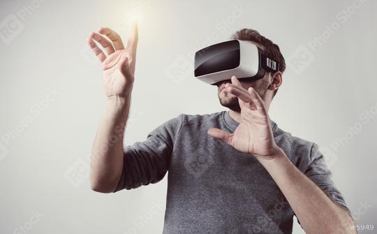 young man wearing Virtual Reality goggles VR Headset  : Stock Photo or Stock Video Download rcfotostock photos, images and assets rcfotostock | RC Photo Stock.: