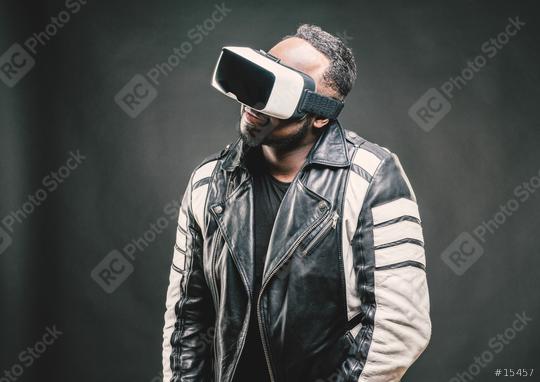 Young man wearing virtual reality googles / VR Glasses  : Stock Photo or Stock Video Download rcfotostock photos, images and assets rcfotostock | RC Photo Stock.: