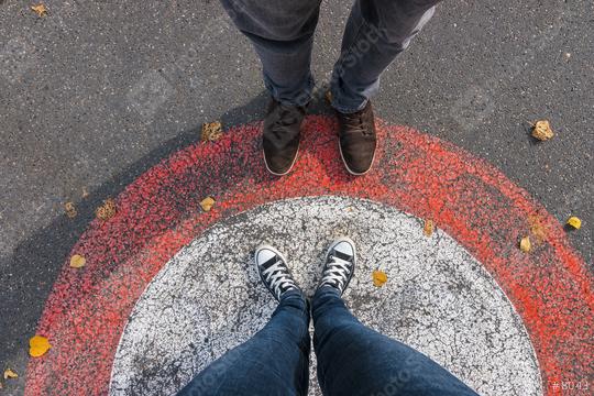young woman and man facing each other at the streets in a circle, personal pespective - pov  : Stock Photo or Stock Video Download rcfotostock photos, images and assets rcfotostock | RC Photo Stock.: