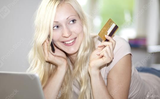 young woman holds credit card  : Stock Photo or Stock Video Download rcfotostock photos, images and assets rcfotostock | RC Photo Stock.: