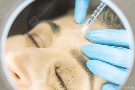 Young Woman Receiving Anti-aging face Beauty Injection In Forehead. Skin Lifting Injection concept image  : Stock Photo or Stock Video Download rcfotostock photos, images and assets rcfotostock | RC Photo Stock.: