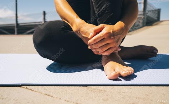 young woman sit on blue yoga or fitness mat after working out. keep fit concepts image  : Stock Photo or Stock Video Download rcfotostock photos, images and assets rcfotostock | RC Photo Stock.: